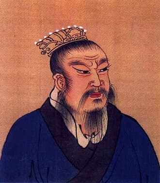 Liu Bang is enthroned as the Emperor of China, beginning four centuries of rule by the Han dynasty.